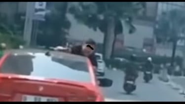 Viral Pria "Nemplok" di Mobil yang Melaju di Jakarta Barat, Begini Penjelasan Polisi