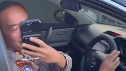 Bentak Pengendara yang Menegur, Polisi Berpangkat AKBP yang Viral Merokok Sambil Nyetir Bersiap Hadapi Sanksi, Nasibnya di Ujung Tanduk