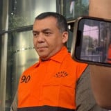 Silmy Salim Resmi Jadi Tersangka, Wamen Imipas Keluar Gedung KPK Pakai Rompi Oranye