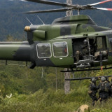 TNI Kerahkan Dua Helikopter Bell Evakuasi Warga dari Pedalaman Ugimba Papua Tengah