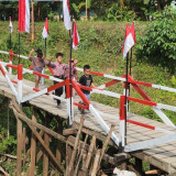 Jembatan Merah Putih Kembali Dibuka, Akses Warga dan Pelajar di Batang Anai Pulih