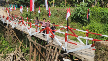 Jembatan Merah Putih Kembali Dibuka, Akses Warga dan Pelajar di Batang Anai Pulih