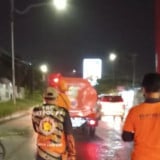 Jalan Protokol di Bandar Lampung Terselimuti Abu Gunung Anak Krakatau, Langsung Dilakukan Penyemprotan